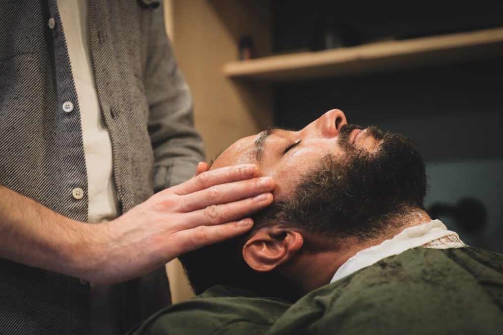 man-with-a-beard-visiting-barbershop-2023-11-27-05-25-44-utc